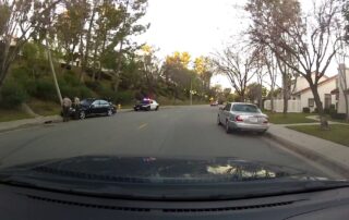 Mercedes crashed into utility pole, video still from dashcam.